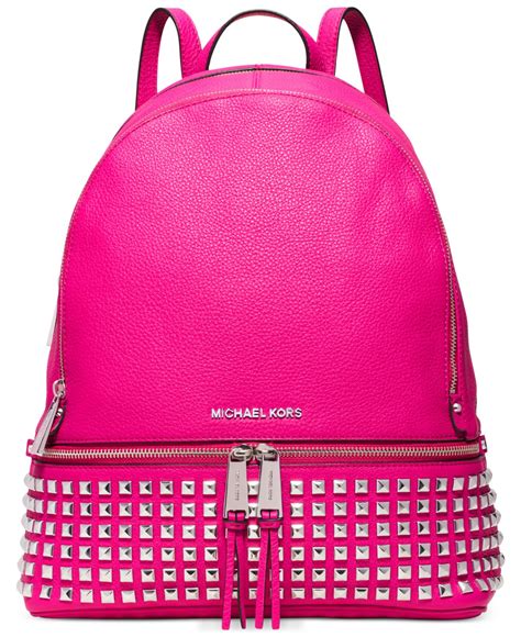 pink micheal kors backpack.